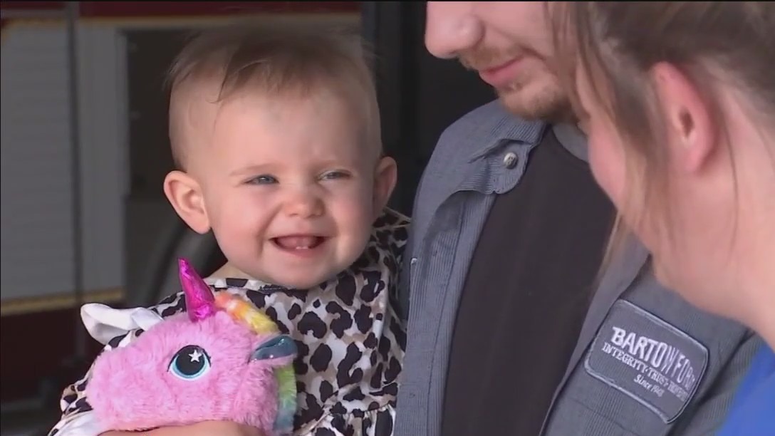 Polk firefighter reunites with baby he saved